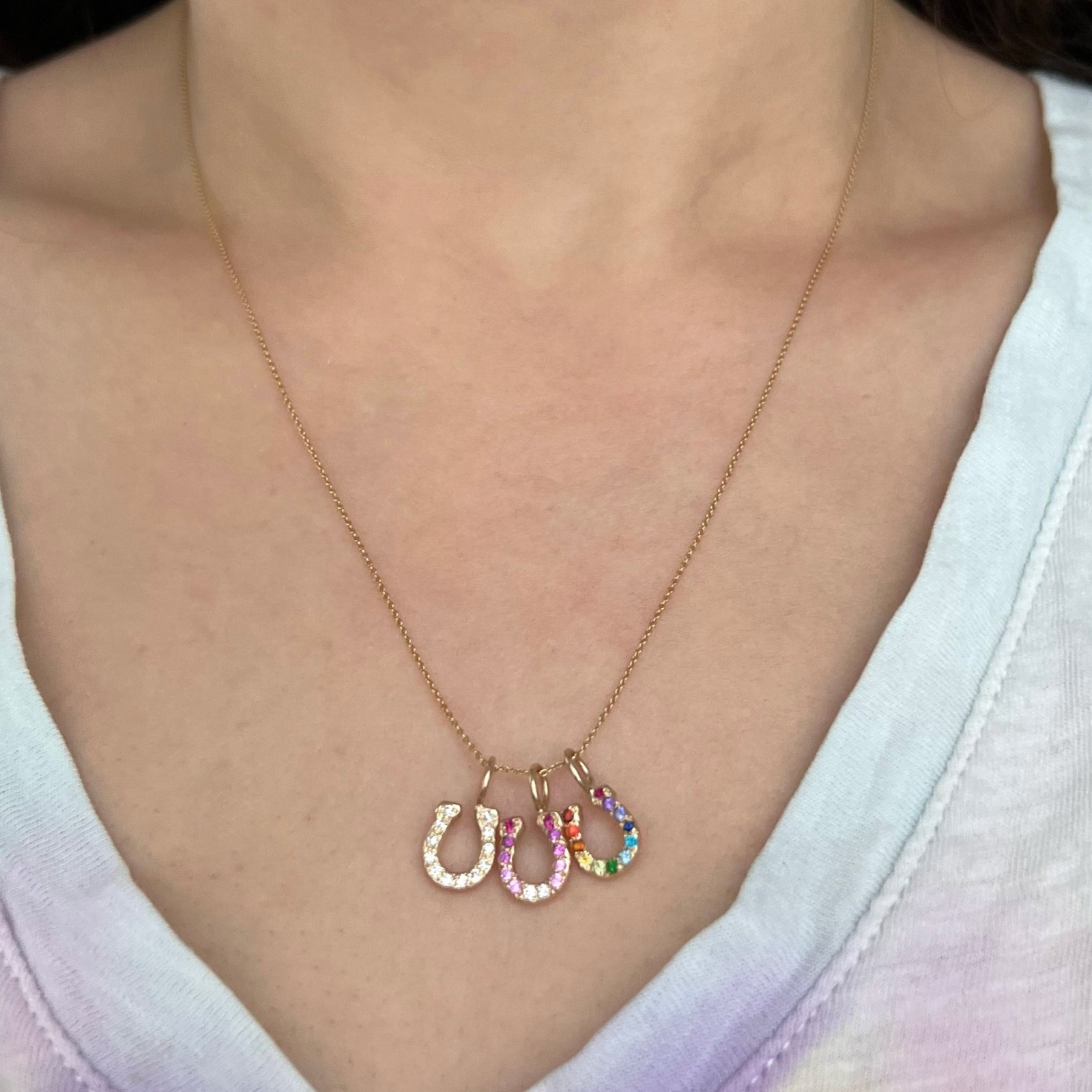 custom encrusted horseshoe charm gold necklace rainbow or ombre diamonds and gemstones